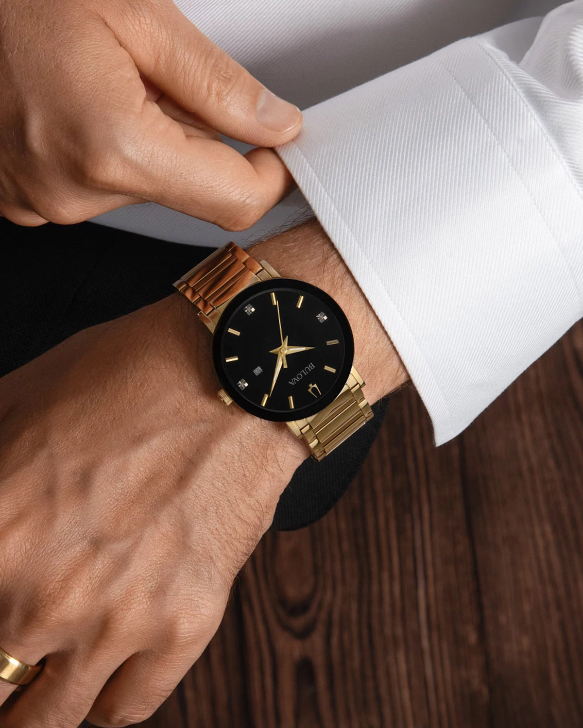 Bulova Futuro 97D116 · Gold-tone, black dial, diamonds — detail view — Bulova at MEDIUM