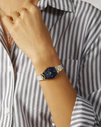 Bulova Gemini Ladies 98P218 · Silver/gold-tone, blue dial — detail view — Bulova at MEDIUM