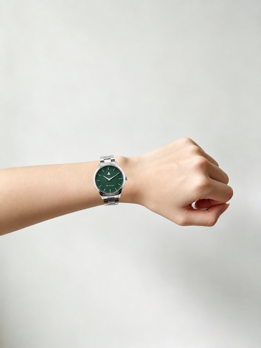 The Comeback First Edition 38mm — Silver / Green — on wrist
