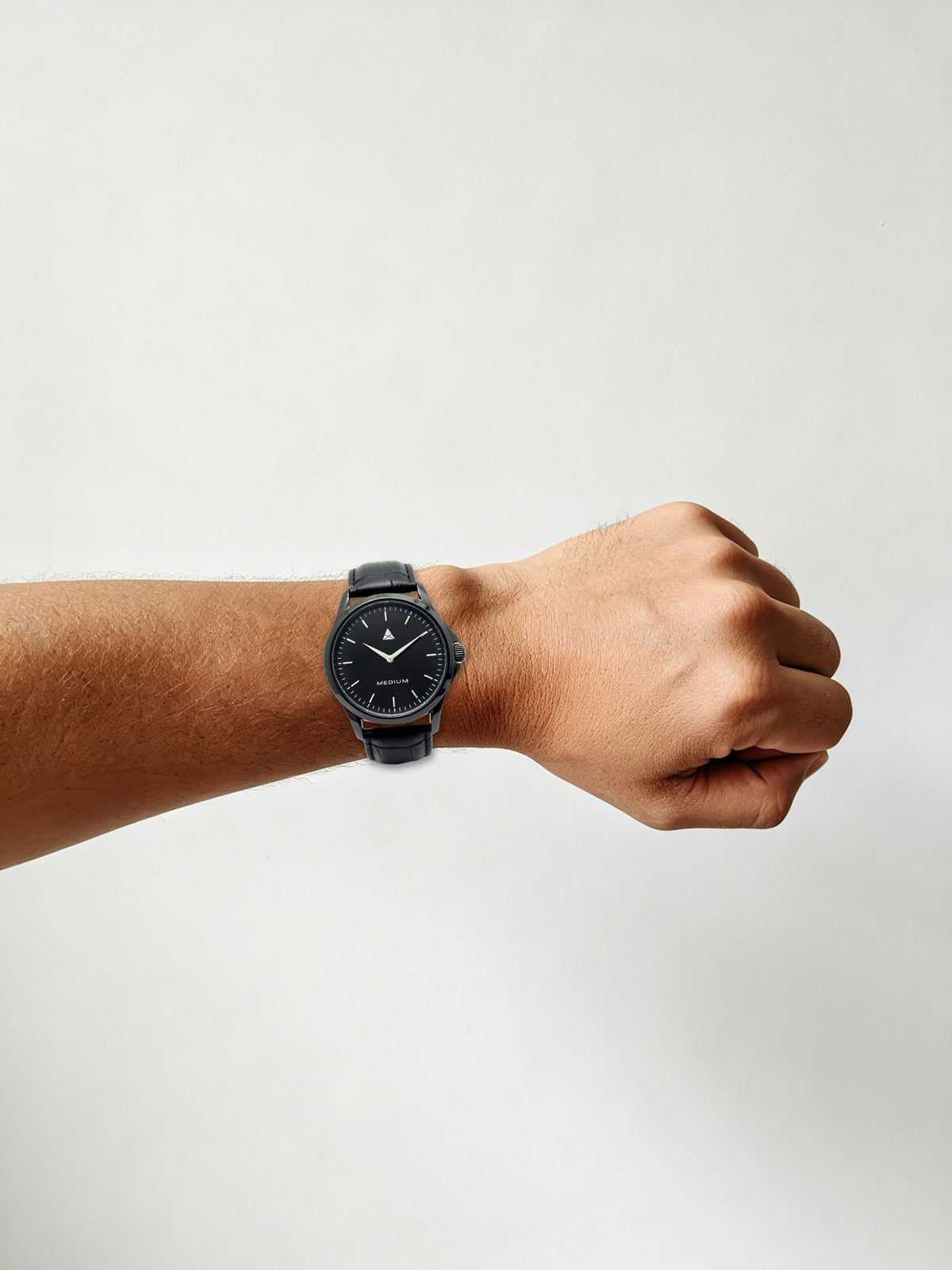 The Comeback Men’s Leather Watch — All Black — on wrist