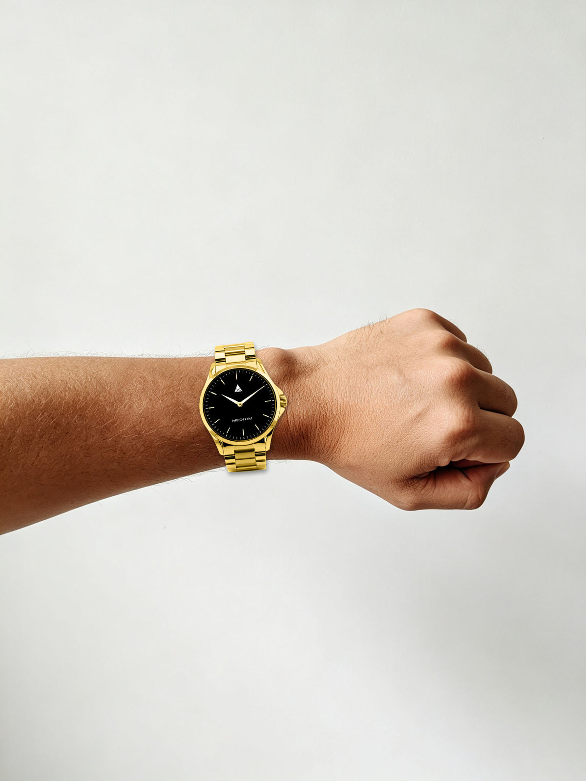 The Comeback Men’s Steel Watch — Gold / Black — on wrist