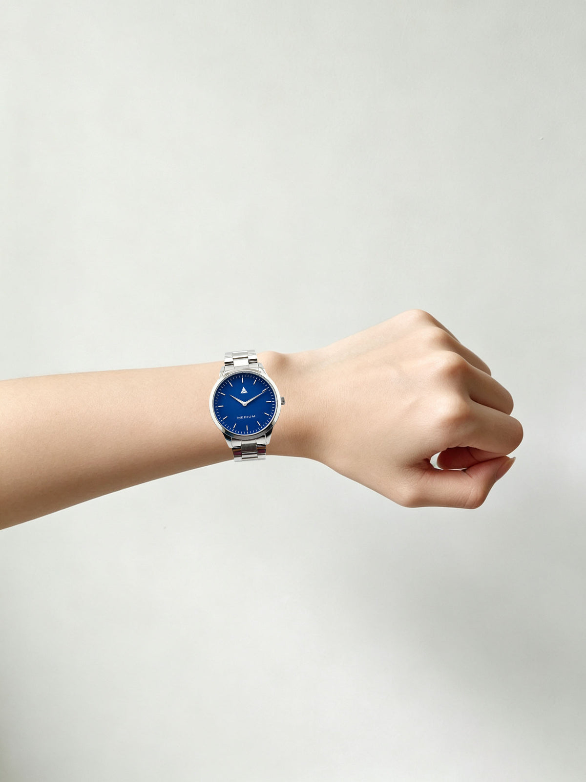 The Comeback Women’s Steel Watch — Silver / Blue — on wrist
