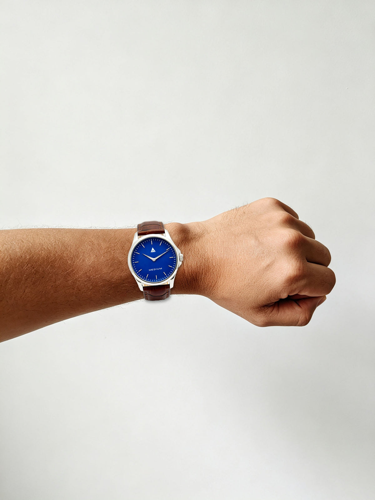 The Comeback Men’s Leather Watch — Silver / Blue — on wrist