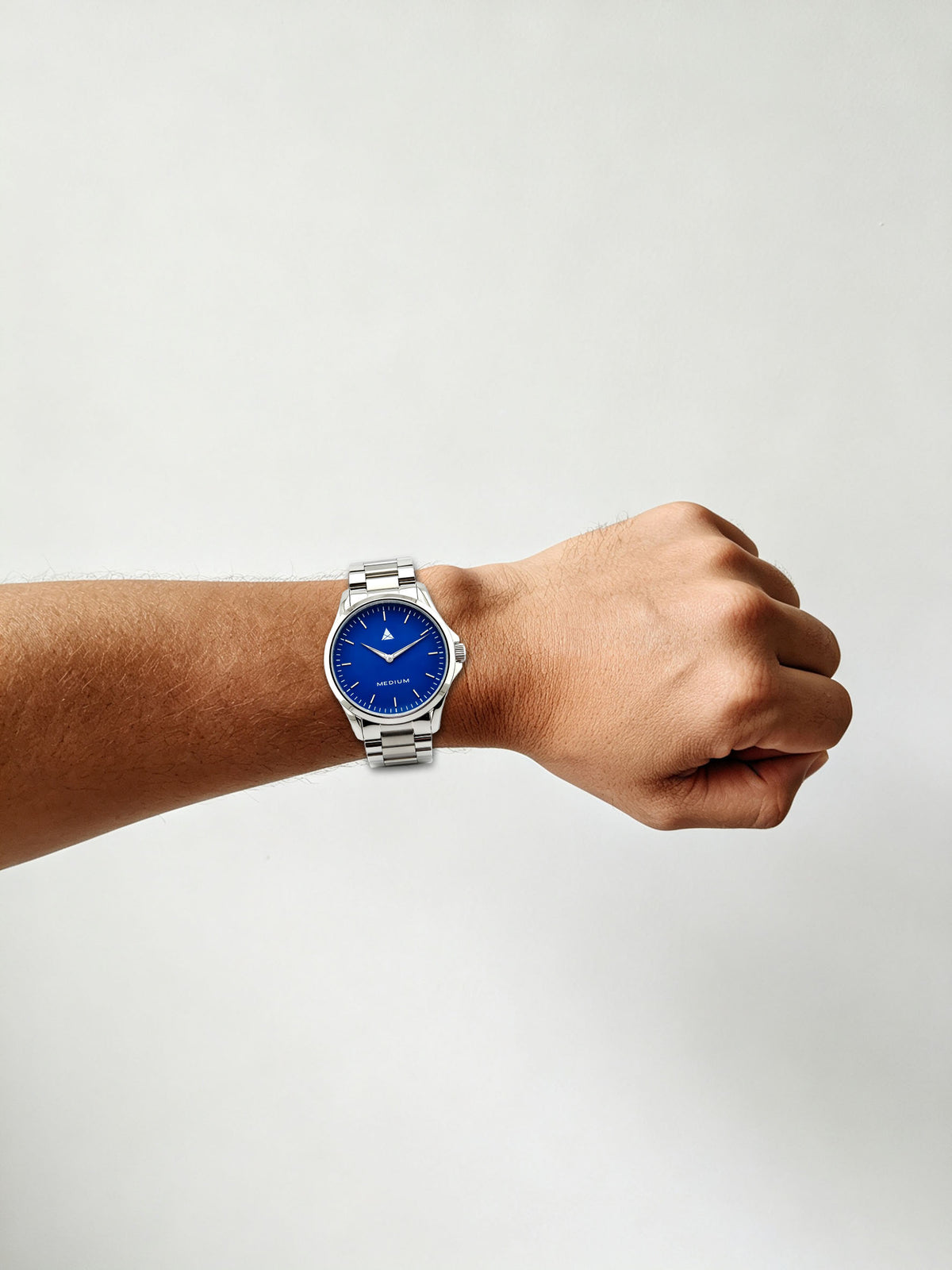 The Comeback Men’s Steel Watch — Silver / Blue — on wrist