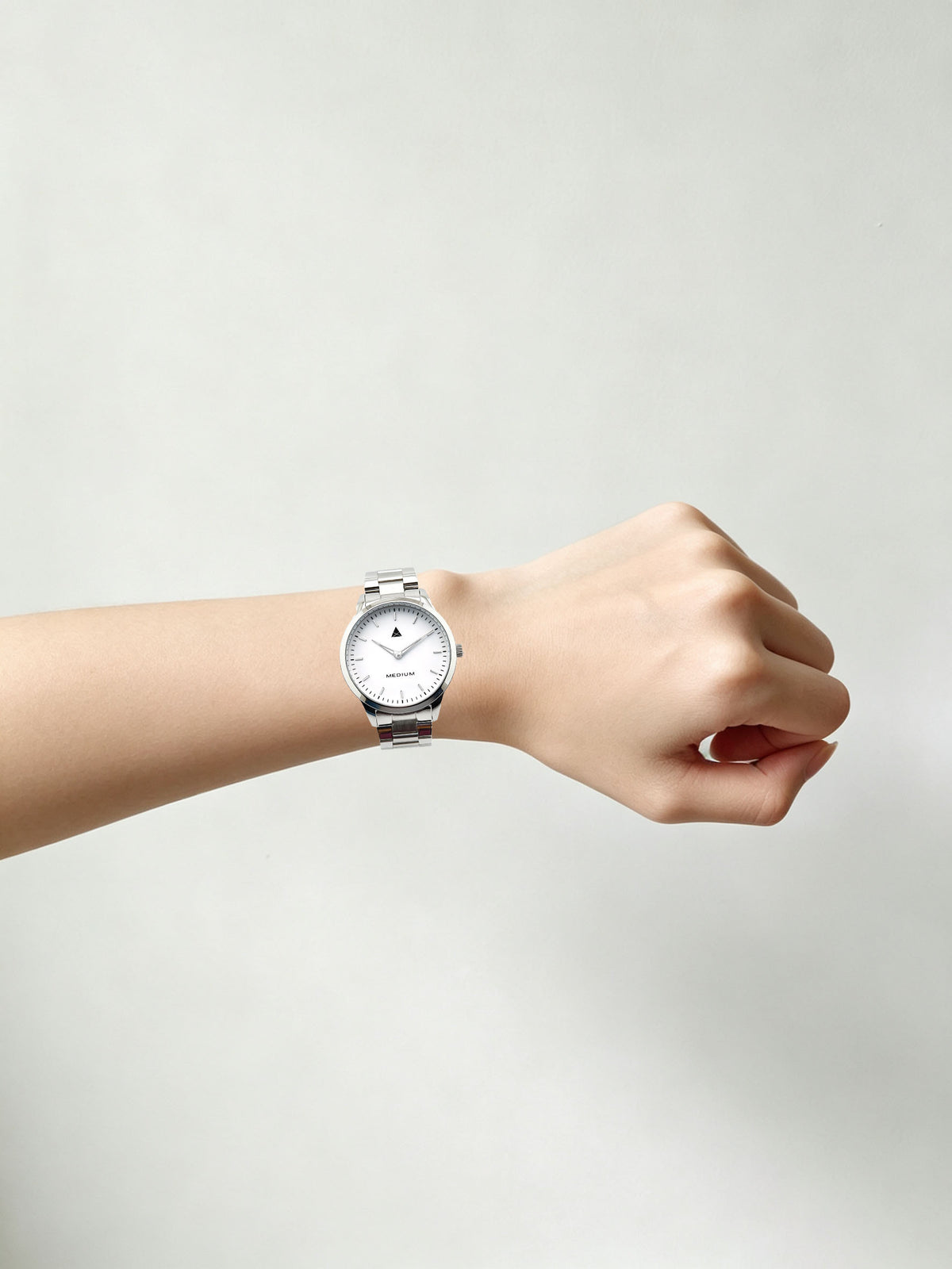 The Comeback Women’s Steel Watch — Silver / White — on wrist
